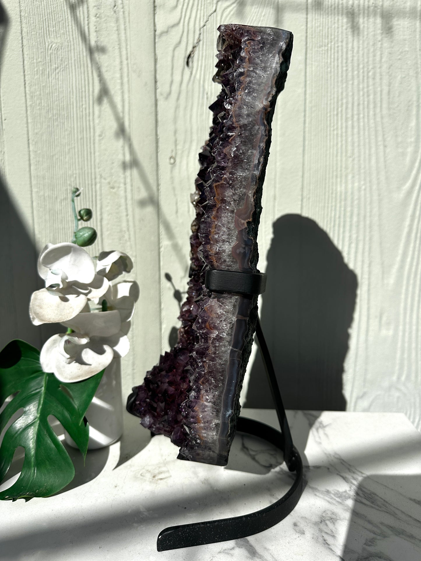 Purple Amethyst cluster with Calcite formation on stand